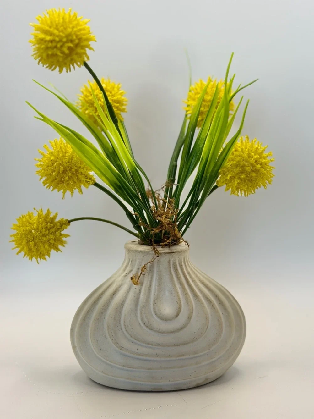 Yellow Pom-Pom Faux Floral Arrangement in Cream Ceramic Vase